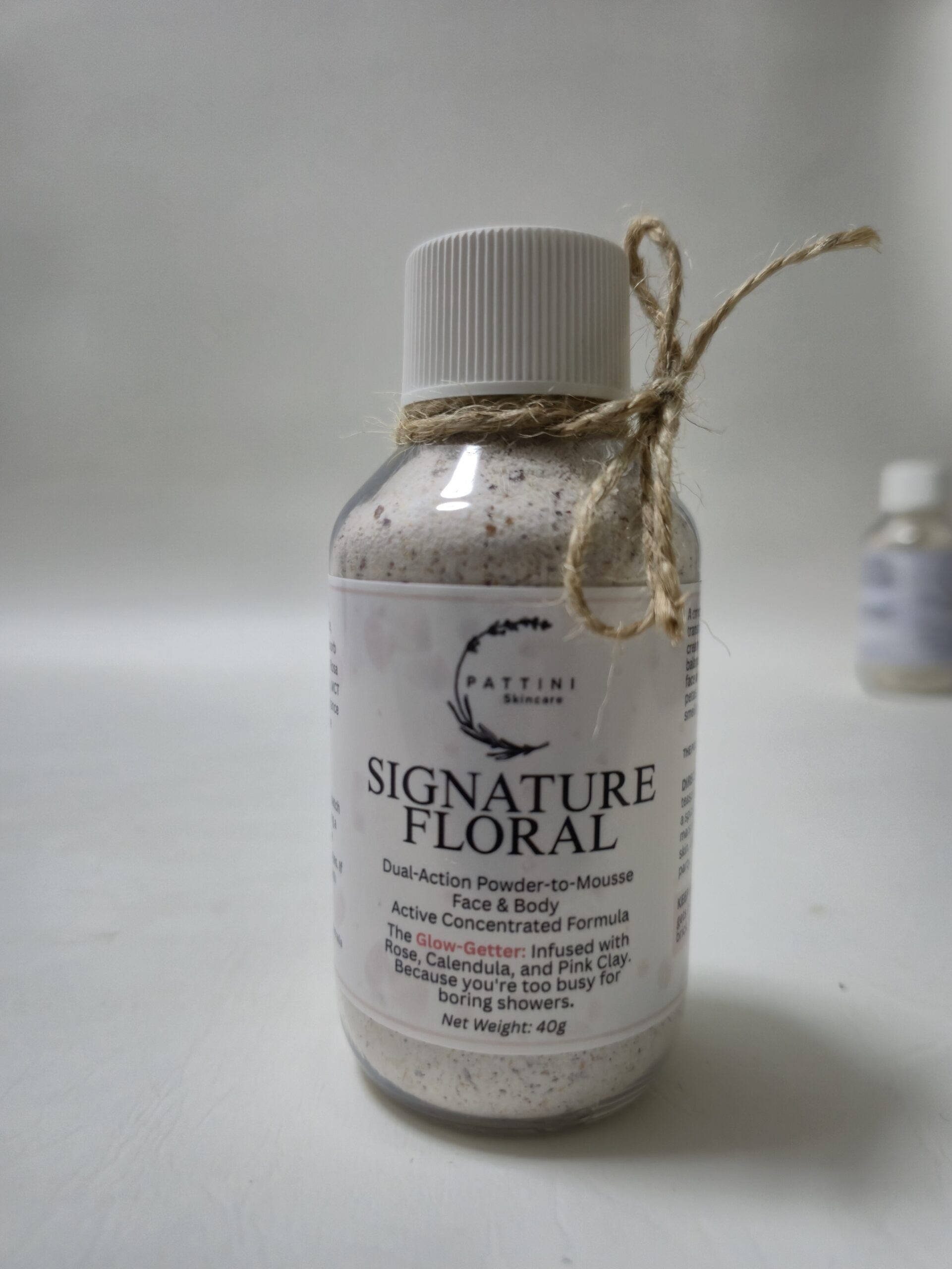 SFP2F40 Signature Floral Powder to Mousse Face & Body 1inbackgroun