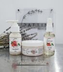 A set of three Pattini Skincare Silky Rose products—a face wash, face moisturiser, and face mist—arranged together with lavender stems in the background.