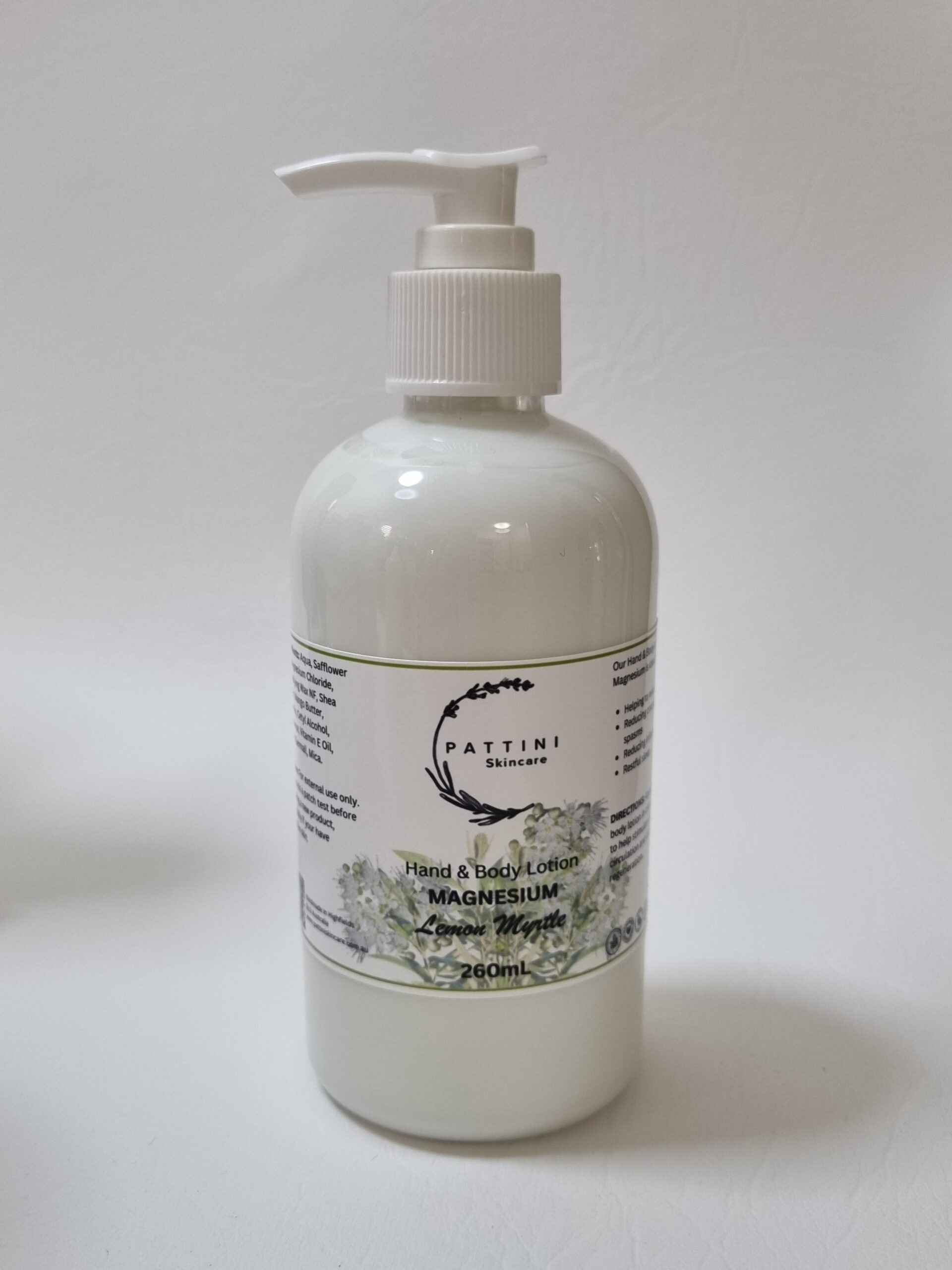 A white pump bottle of Pattini Skincare product with a botanical-themed label placed against a plain light background.